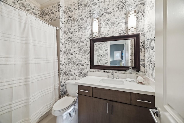full bath featuring vanity, ornamental molding, toilet, and wallpapered walls