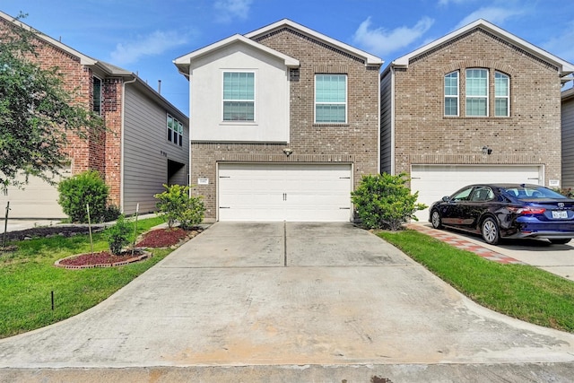 11417 Hackmatack Way, Houston, TX 77066 - view of front facade with a garage, brick siding, and concrete driveway