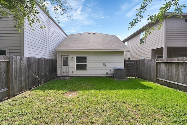 11417 Hackmatack Way, Houston, TX 77066 - rear view of property with central AC and a shingled roof