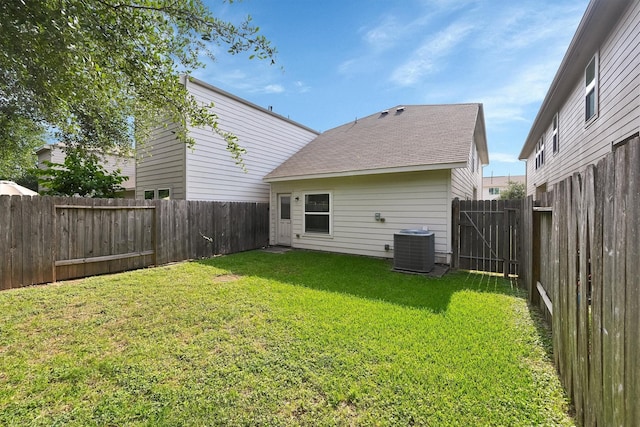 11417 Hackmatack Way, Houston, TX 77066 - back of house featuring central AC unit and roof with shingles