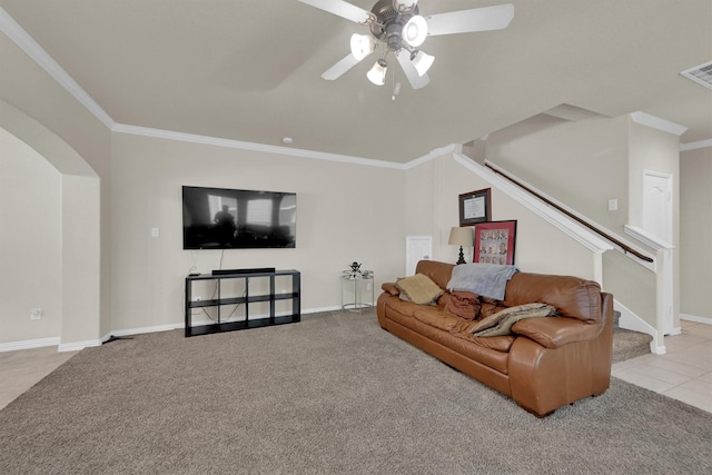 11417 Hackmatack Way, Houston, TX 77066 - tiled living room with stairs, carpet flooring, arched walkways, and crown molding