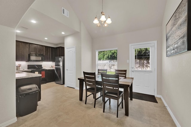 11417 Hackmatack Way, Houston, TX 77066 - dining room featuring a chandelier, lofted ceiling, recessed lighting, and baseboards
