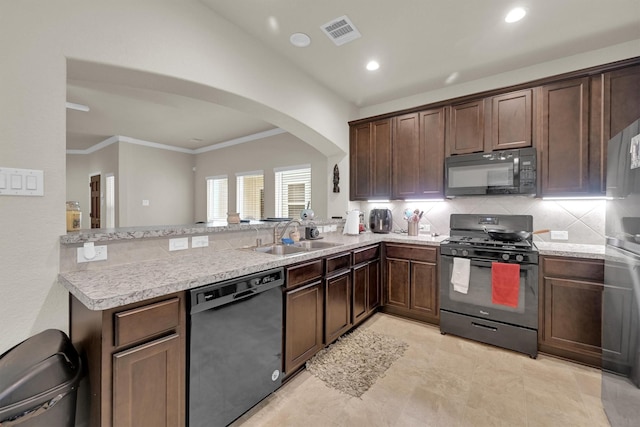 11417 Hackmatack Way, Houston, TX 77066 - kitchen with black appliances, a sink, arched walkways, light countertops, and crown molding