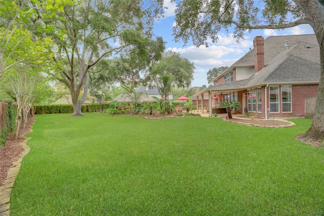 view of yard featuring fence
