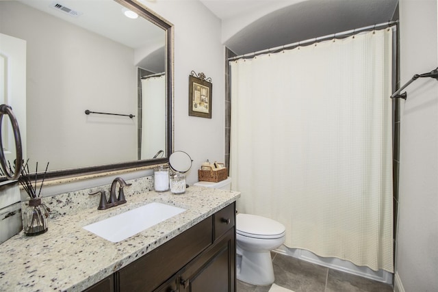 34119 Mill Creek Way, Pinehurst, TX 77362 - full bath featuring visible vents, tile patterned floors, toilet, and vanity