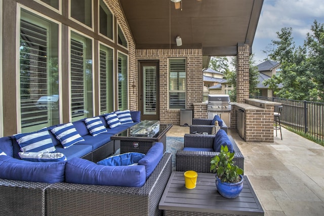 34119 Mill Creek Way, Pinehurst, TX 77362 - view of patio / terrace with area for grilling, exterior kitchen, exterior bar, and an outdoor hangout area