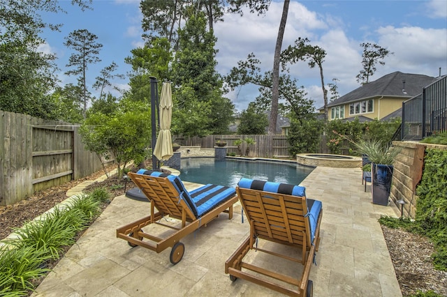 34119 Mill Creek Way, Pinehurst, TX 77362 - view of swimming pool with a fenced in pool, a fenced backyard, a patio area, and an in ground hot tub