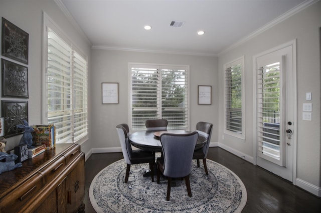 34119 Mill Creek Way, Pinehurst, TX 77362 - dining room with ornamental molding, dark wood-style floors, and a healthy amount of sunlight