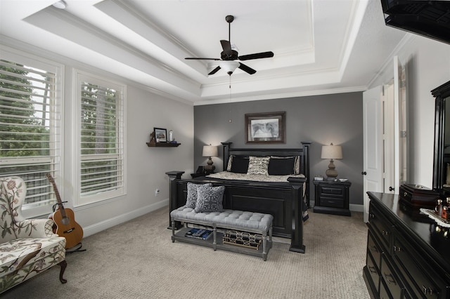 34119 Mill Creek Way, Pinehurst, TX 77362 - bedroom featuring ceiling fan, light colored carpet, crown molding, a raised ceiling, and baseboards