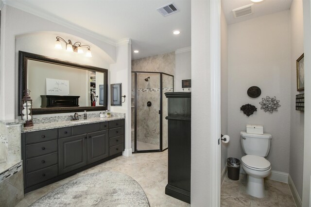 34119 Mill Creek Way, Pinehurst, TX 77362 - bathroom featuring vanity, ornamental molding, a stall shower, and visible vents