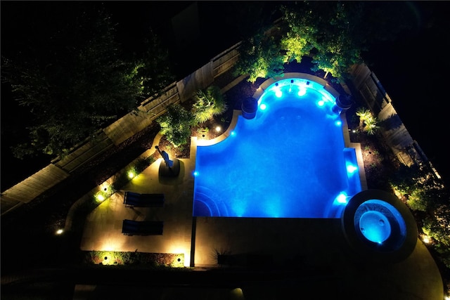 34119 Mill Creek Way, Pinehurst, TX 77362 - view of pool at night