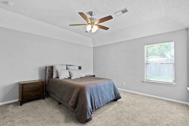 bedroom featuring baseboards, ceiling fan, carpet, and visible vents
