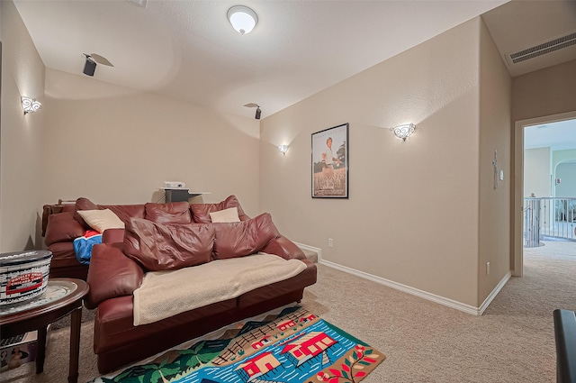 living room with carpet flooring, baseboards, and visible vents