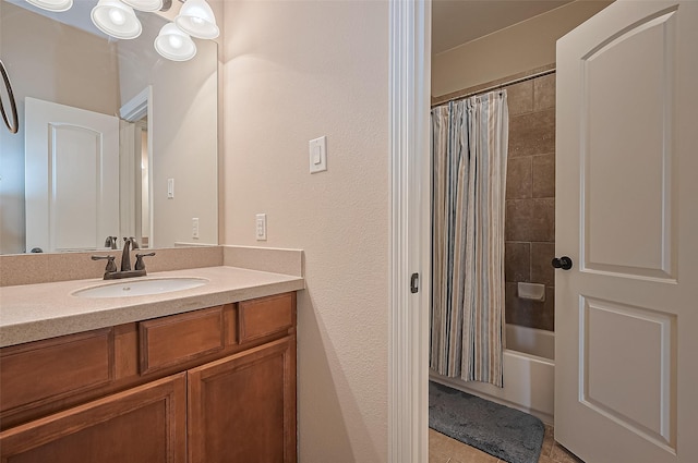 bathroom featuring vanity, tile patterned flooring, and shower / tub combo with curtain