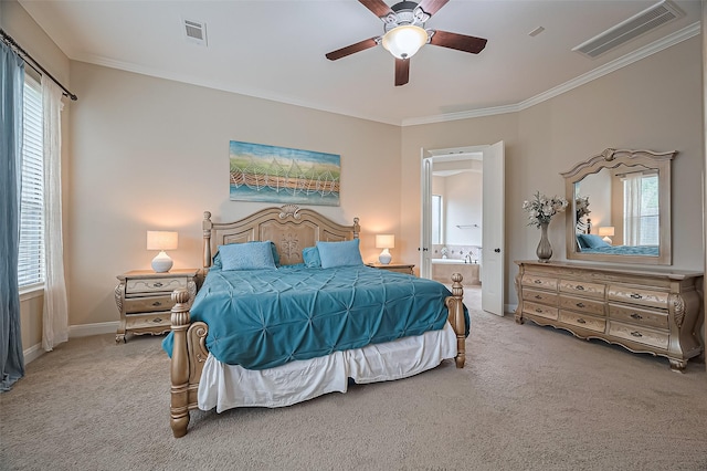 carpeted bedroom with visible vents and multiple windows