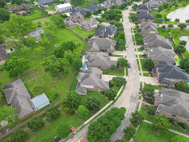 aerial view featuring a residential view and a water view