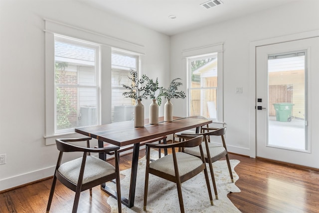 1026 Fugate St, Houston, TX 77009 - dining area featuring wood finished floors and baseboards