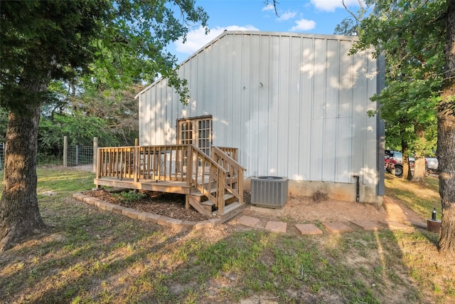 view of outbuilding with central air condition unit