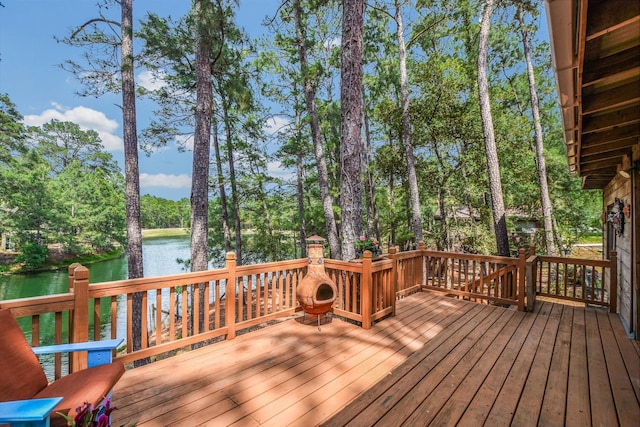 deck featuring a water view