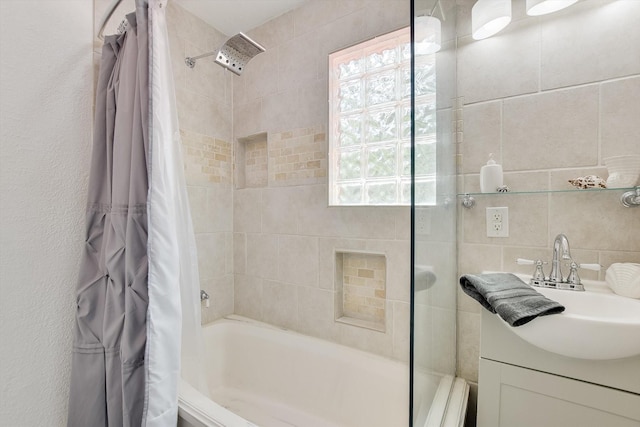 bathroom featuring vanity and shower / bath combo with shower curtain