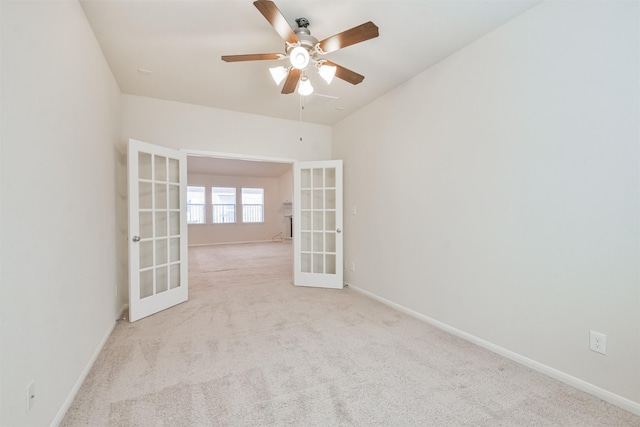 9135 Monarch Field Ln, Cypress, TX 77433 - carpeted empty room featuring french doors, a ceiling fan, and baseboards