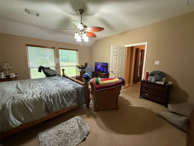 8813 Lauren Ln, Waller, TX 77484 - carpeted bedroom with a ceiling fan, visible vents, and vaulted ceiling