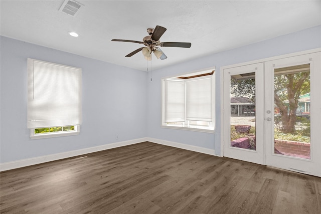 331 Terminal St, Houston, TX 77020 - empty room featuring ceiling fan, french doors, visible vents, baseboards, and dark wood-style floors