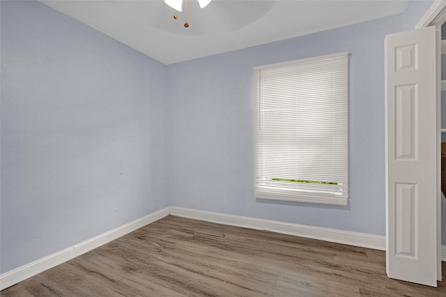 331 Terminal St, Houston, TX 77020 - spare room with baseboards, a ceiling fan, and wood finished floors