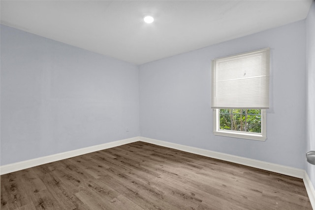 331 Terminal St, Houston, TX 77020 - spare room with baseboards and wood finished floors