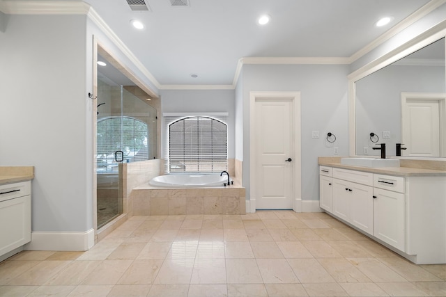 bathroom featuring crown molding, baseboards, and vanity