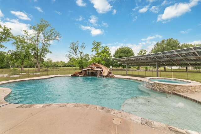 6820 Cemetary Rd, Manvel, TX 77578 - view of swimming pool with a water slide and a pool with connected hot tub