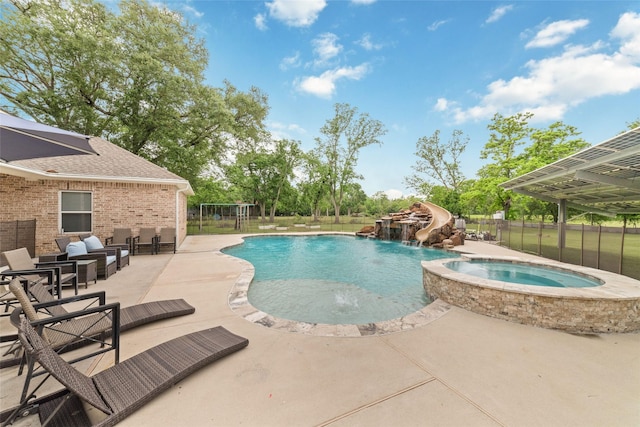 6820 Cemetary Rd, Manvel, TX 77578 - view of pool featuring a patio area, a pool with connected hot tub, and fence