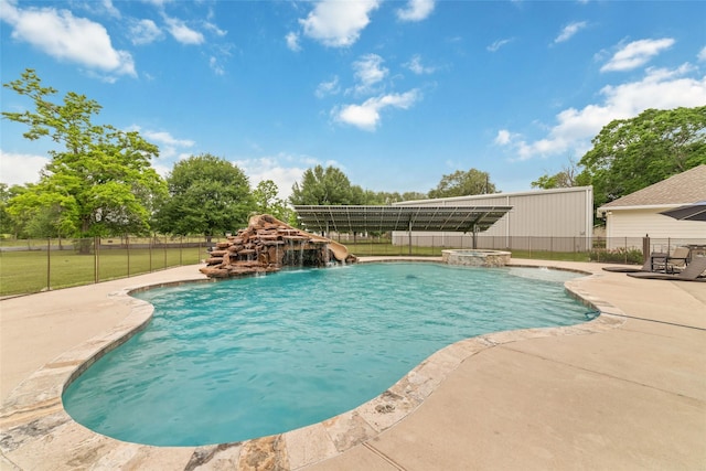 6820 Cemetary Rd, Manvel, TX 77578 - view of swimming pool with fence, a patio area, a water slide, and a pool with connected hot tub