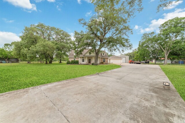 6820 Cemetary Rd, Manvel, TX 77578 - cape cod-style house with driveway