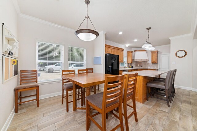 6820 Cemetary Rd, Manvel, TX 77578 - dining area featuring ornamental molding, baseboards, recessed lighting, and light wood-style floors