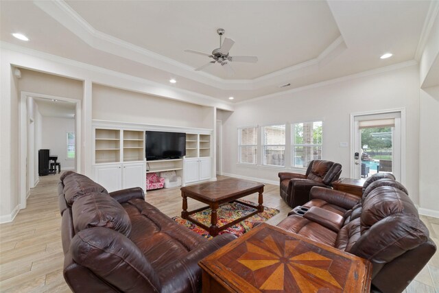 6820 Cemetary Rd, Manvel, TX 77578 - living room with ceiling fan, ornamental molding, a tray ceiling, recessed lighting, and baseboards