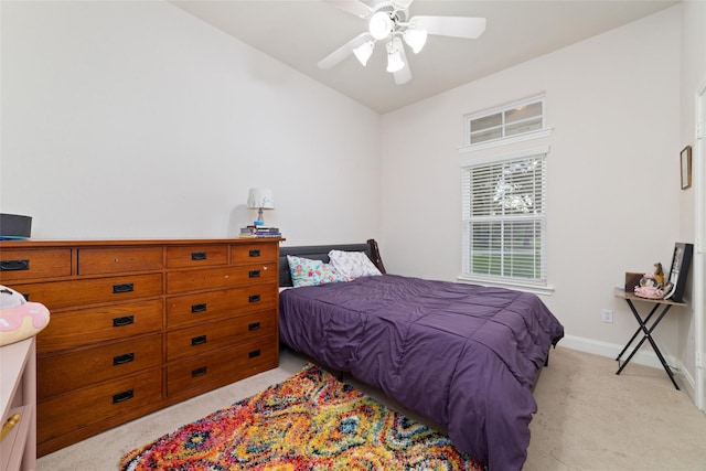 6820 Cemetary Rd, Manvel, TX 77578 - bedroom with light colored carpet, lofted ceiling, baseboards, and a ceiling fan