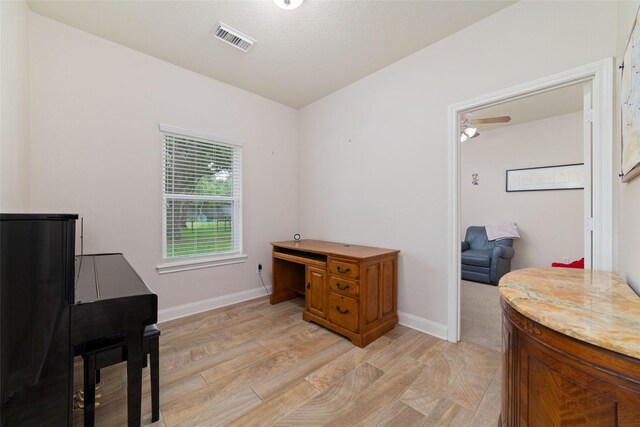 6820 Cemetary Rd, Manvel, TX 77578 - office area featuring light wood-style flooring and baseboards