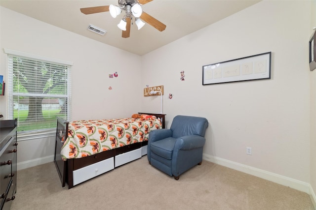 6820 Cemetary Rd, Manvel, TX 77578 - bedroom featuring light colored carpet, baseboards, and ceiling fan