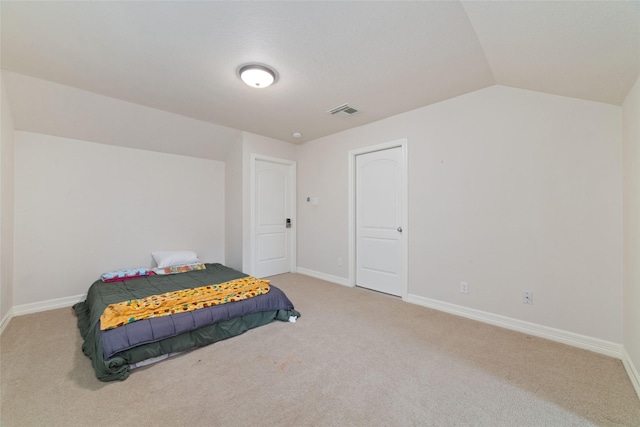 6820 Cemetary Rd, Manvel, TX 77578 - bedroom featuring light colored carpet, baseboards, and lofted ceiling