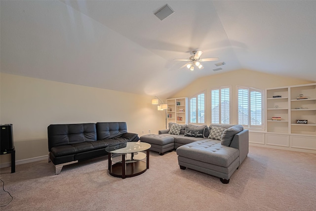 living area featuring a ceiling fan, visible vents, baseboards, lofted ceiling, and carpet flooring
