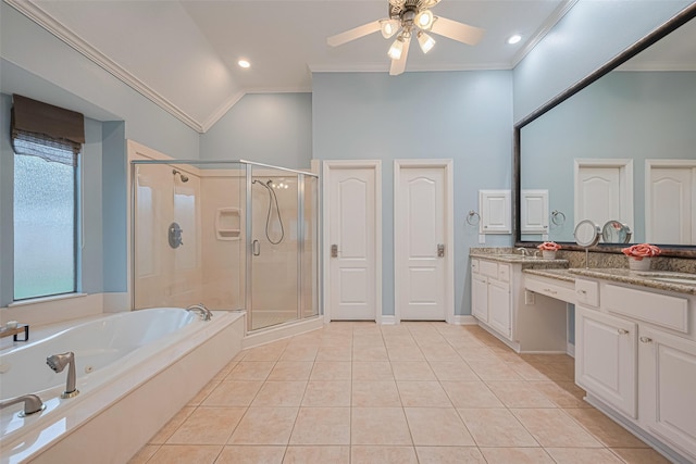bathroom featuring a tub with jets, vaulted ceiling, ornamental molding, and a shower stall