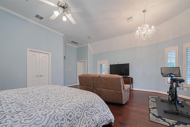 bedroom featuring ornamental molding, visible vents, and dark wood-type flooring