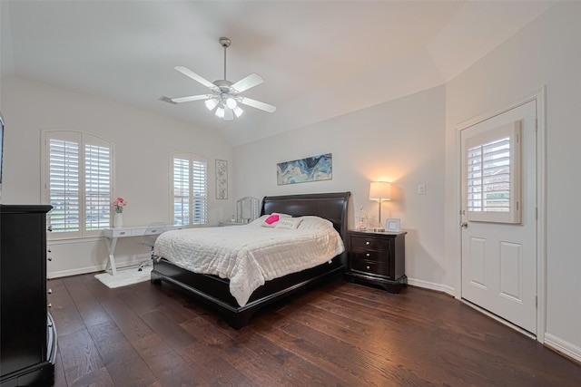 bedroom with baseboards, ceiling fan, dark wood-style floors, and lofted ceiling