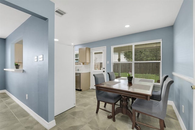 dining area featuring baseboards, recessed lighting, and visible vents