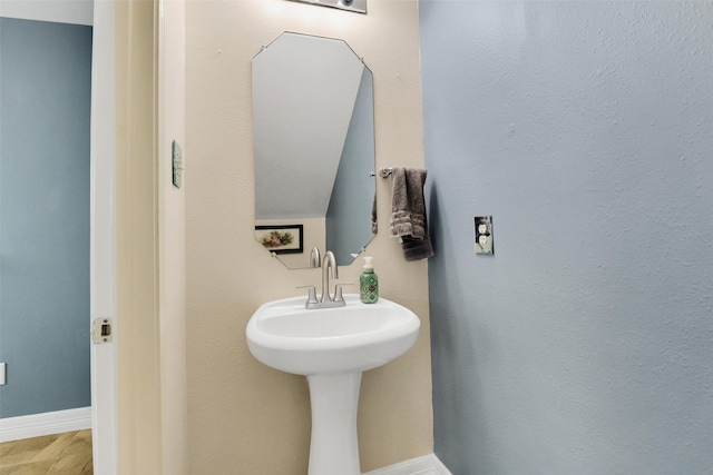 bathroom with baseboards