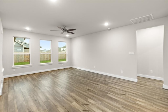 32307 Fly Fish Way, Fulshear, TX 77441 - spare room featuring recessed lighting, baseboards, visible vents, and wood finished floors