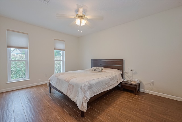 14811 El Miranda Dr, Houston, TX 77095 - bedroom with baseboards, a ceiling fan, and wood finished floors