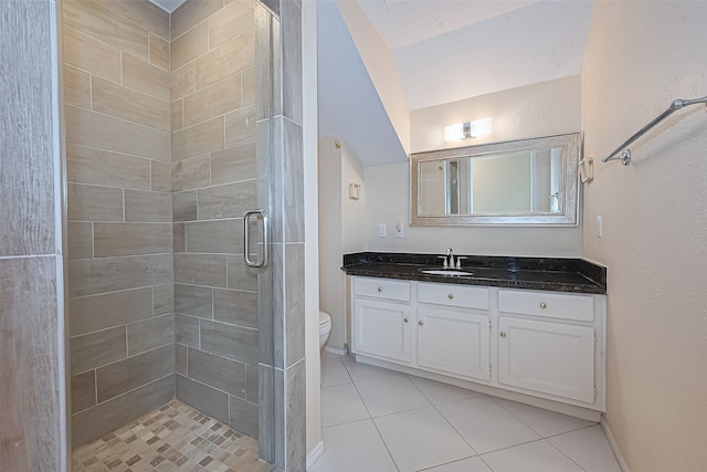 14811 El Miranda Dr, Houston, TX 77095 - bathroom with a stall shower, vanity, tile patterned floors, baseboards, and toilet