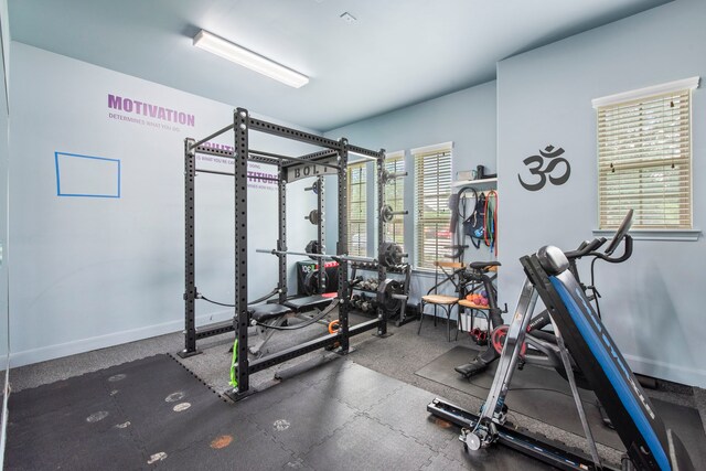 24818 Waterstone Estates Cir W, Tomball, TX 77375 - workout area featuring baseboards